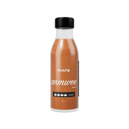 Bouteille de Sauce Anmwee Phafo, sauce piquante haïtienne fermentée de couleur orangée